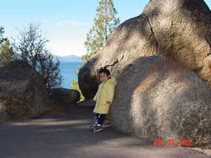 One-year old in front of boulder at Lake Tahoe