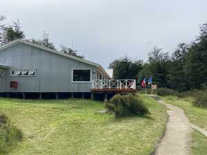 Corrugated steel building in clearing