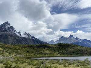 Mountains above grassy hills