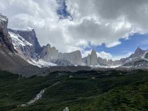 Lookout of forest surrounded by mountains