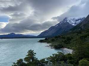 Blue lake with mountain behind