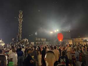 Red lantern above crowd at night
