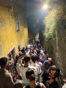 Crowded alleyway at night
