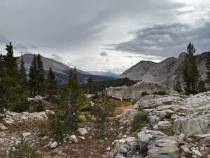 Mountain valley in clouds