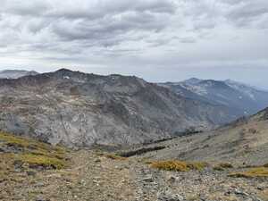 Mountainous valley with sparse vegetation