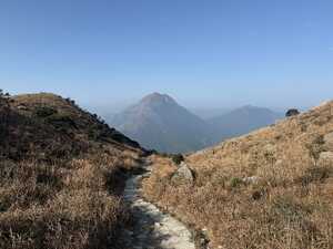 Mountain peak between two hills