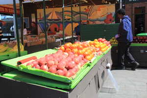 Fresh fruit stand in sunlight