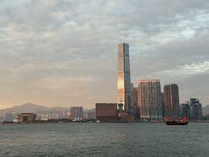 Sunset on skyscraper across water