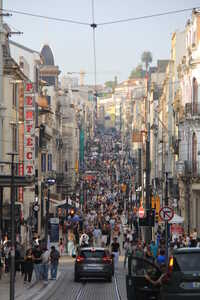 Crowded street with old fashioned buildings