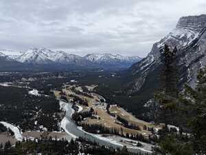 Mountain overlooking valley in snow