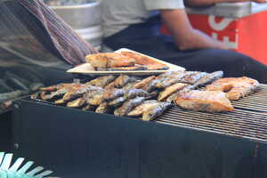Grilled fish on grill