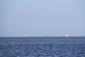 Skyline in the distance across the water