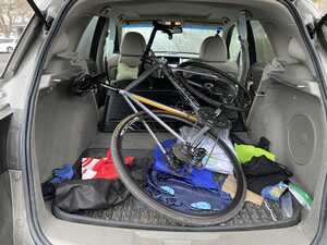 Road bike in back of car