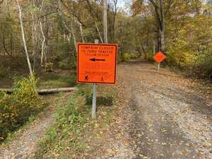 Orange detour sign