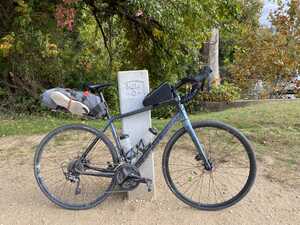 Bike in front of stone marker