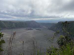 Looking down on volcanic crater floor with lush sides