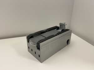 Gray Lego box with treads