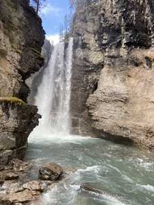 Waterfall within rock canyon