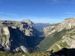 Tree-filled valley flanked by sheer stone walls