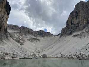 Lake surrounded by rock faces