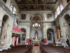 Church interior with elaborate painted panels