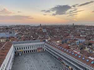 Looking down on old city into sunet with clouds