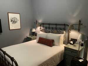 Bed with nightstands and lamps