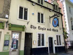 Old fashioned pub with sign outside