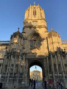 Gothic clock tower with arch underneath