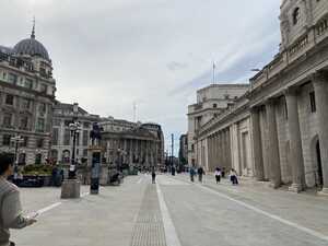 Intersection with classical stone buildings and colunnade