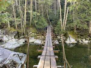 Suspension bridge over a stream